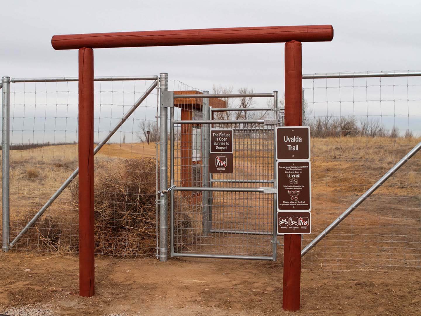 Commercial chain link fence with multiple gates installed at an entryway in Colorado